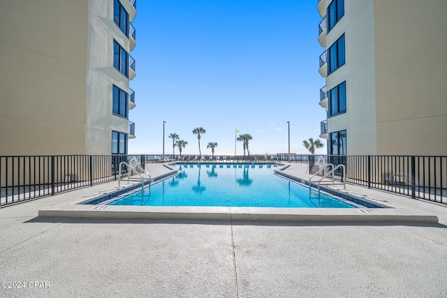 view of pool with a patio