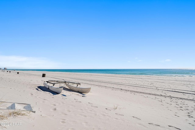 view of water feature with a beach view