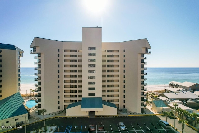 view of building exterior with a water view