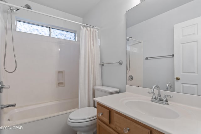 full bathroom featuring toilet, vanity, and shower / bathtub combination with curtain