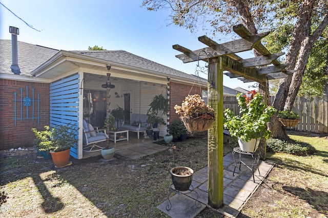 view of yard featuring a patio and a pergola