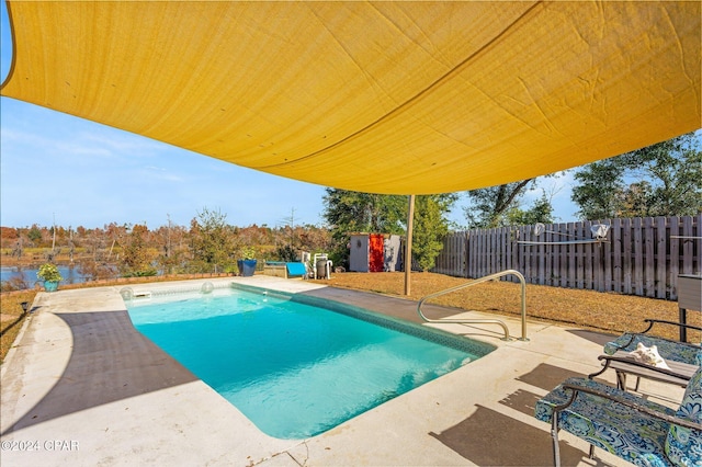 view of pool featuring a patio