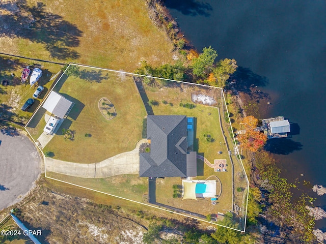 birds eye view of property featuring a water view