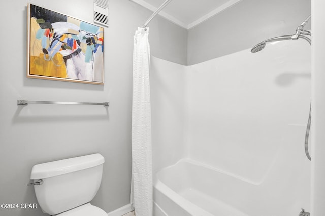 bathroom featuring visible vents, shower / bath combo, and toilet