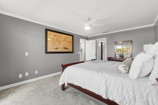 carpeted bedroom with baseboards, visible vents, ceiling fan, and ornamental molding