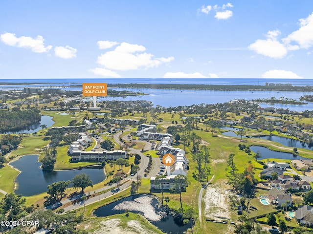 drone / aerial view featuring a residential view and a water view