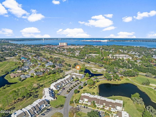 drone / aerial view with a residential view and a water view