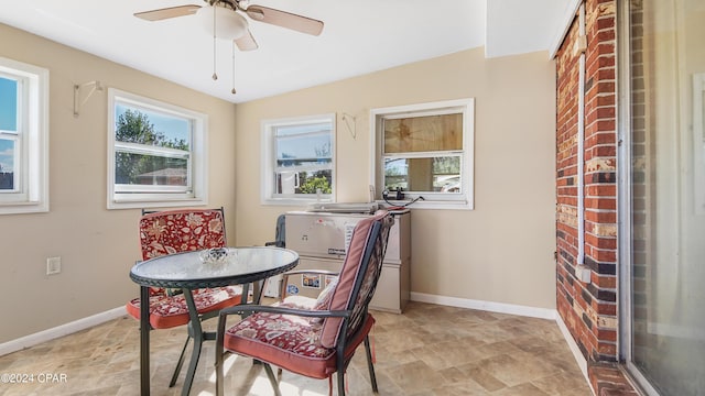 dining space featuring ceiling fan