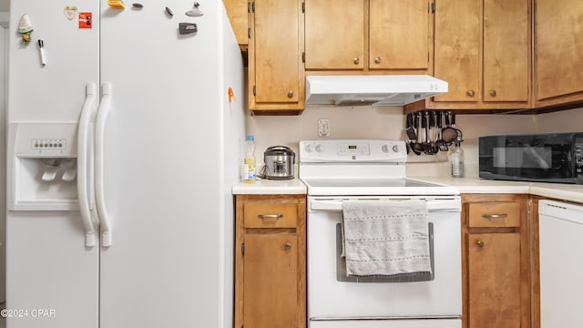 kitchen featuring white appliances