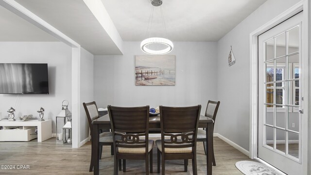 dining room featuring light hardwood / wood-style flooring