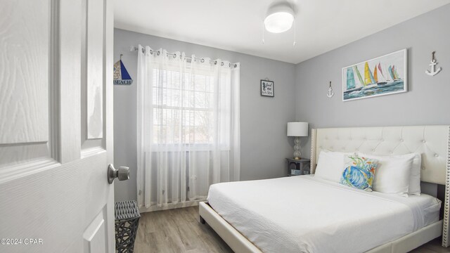 bedroom with light hardwood / wood-style floors