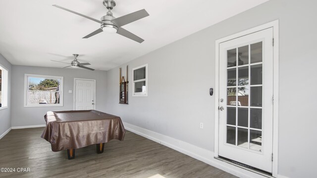 dining room featuring ceiling fan, dark hardwood / wood-style floors, and billiards