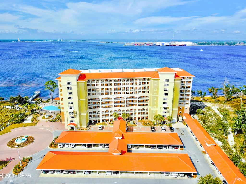 birds eye view of property featuring a water view