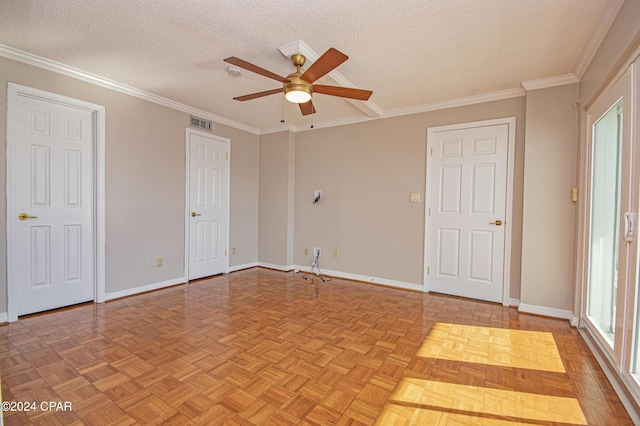 unfurnished bedroom with a textured ceiling, ceiling fan, crown molding, and light parquet flooring