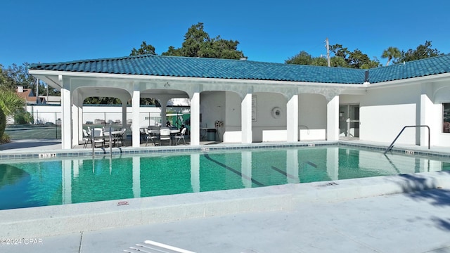 view of pool featuring a patio