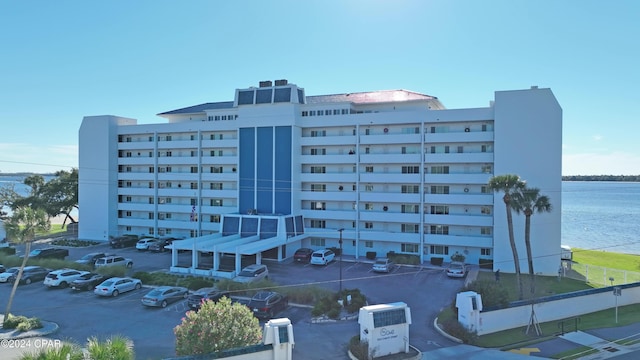 view of building exterior with a water view