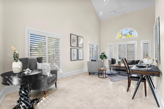 home office featuring high vaulted ceiling, a wealth of natural light, and ceiling fan