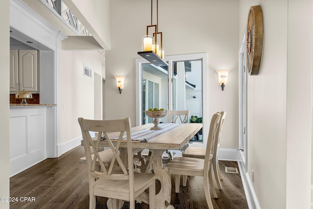 dining room featuring dark wood-type flooring