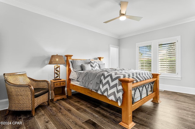 bedroom with dark wood-type flooring, ceiling fan, and ornamental molding