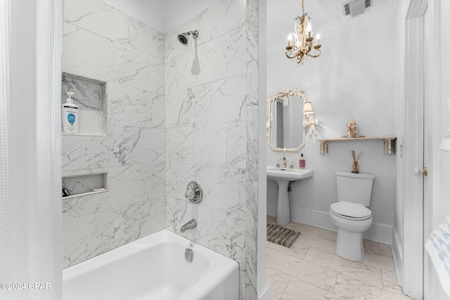 bathroom featuring toilet, a chandelier, and shower / bath combination with curtain