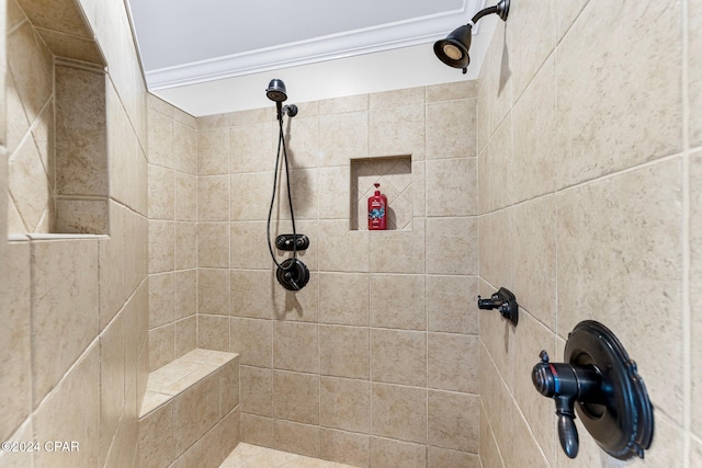 bathroom with tiled shower