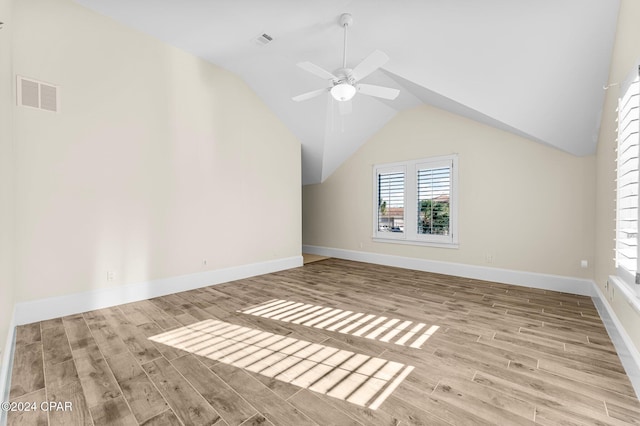 additional living space with lofted ceiling, ceiling fan, and light hardwood / wood-style floors