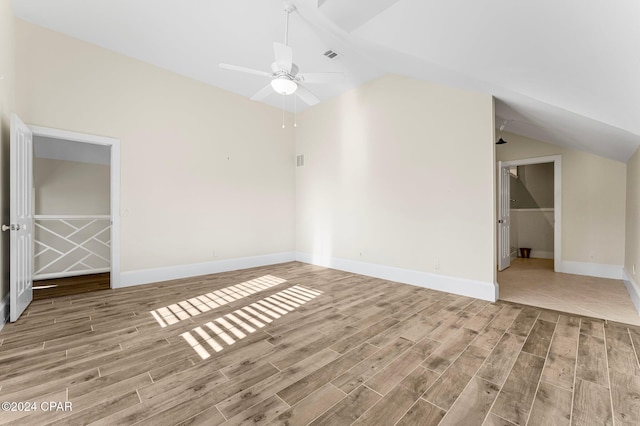 unfurnished living room with lofted ceiling and ceiling fan