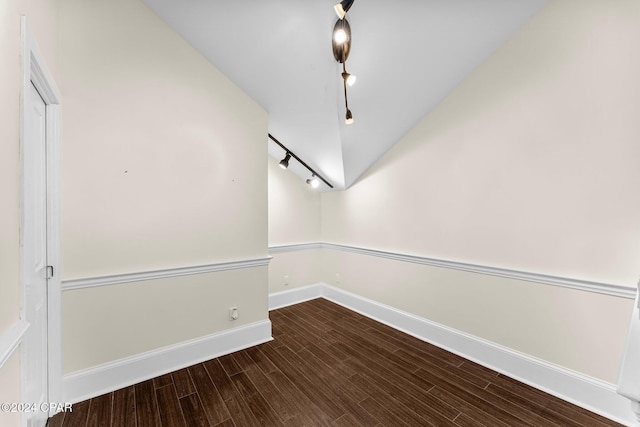 empty room with lofted ceiling