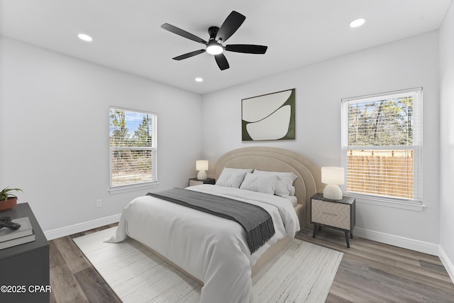 bedroom featuring ceiling fan and wood-type flooring