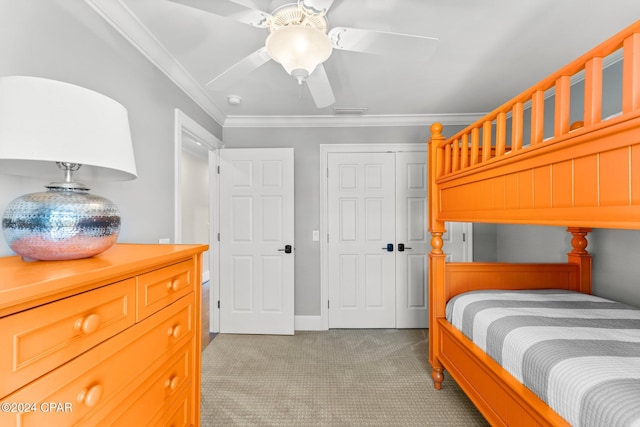 4301 Bay Point Rd Unit 479, Panama City Beach, FL 32408 - bedroom featuring visible vents, ceiling fan, crown molding, carpet floors, and a closet
