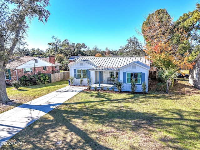 view of front of home with a front yard