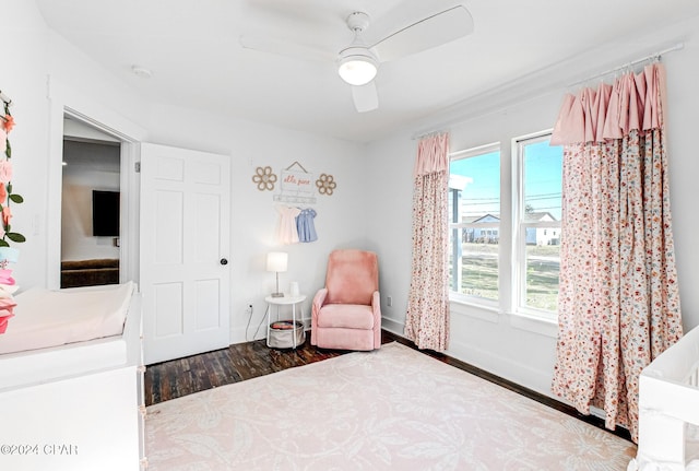 bedroom featuring hardwood / wood-style floors and ceiling fan