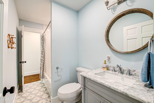 full bathroom with vanity, toilet, and shower / bath combo