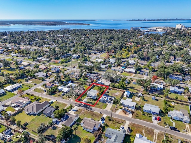 aerial view with a residential view and a water view