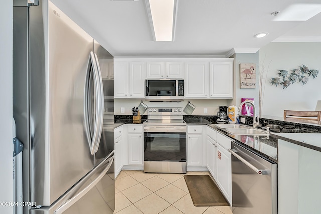 kitchen featuring white cabinetry, sink, and appliances with stainless steel finishes