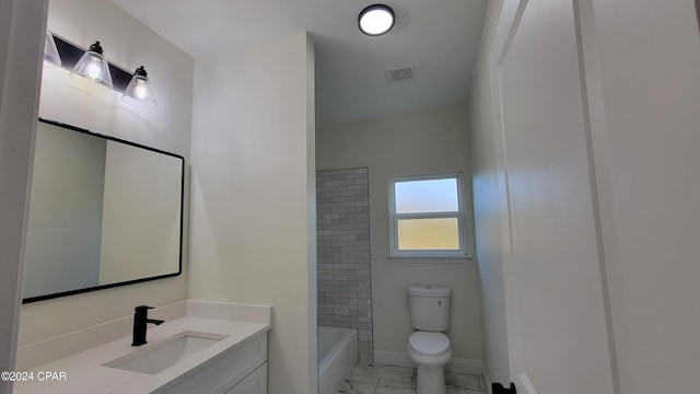 full bathroom featuring vanity, bathing tub / shower combination, and toilet