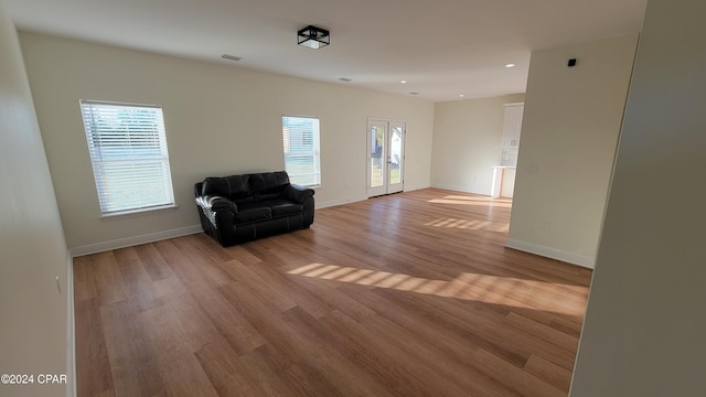 unfurnished room with light hardwood / wood-style flooring