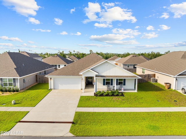 ranch-style home with a front yard, a porch, and a garage