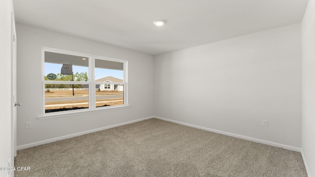 empty room with carpet floors