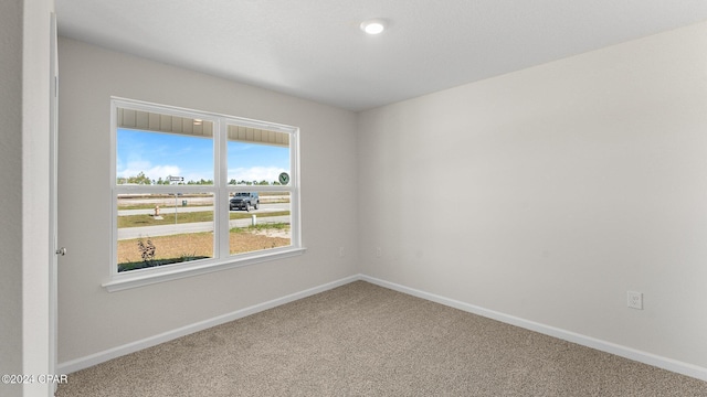 view of carpeted spare room