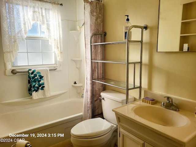 full bathroom with shower / bathtub combination with curtain, vanity, and toilet