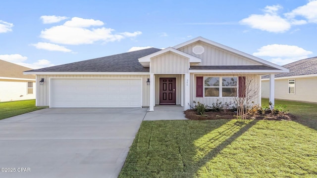 view of front facade featuring a garage and a front lawn