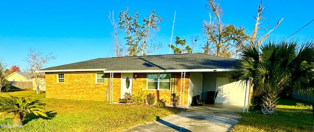 ranch-style home featuring a front yard and a carport