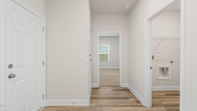 corridor featuring light hardwood / wood-style flooring