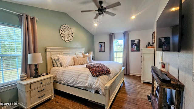 bedroom with ceiling fan, dark hardwood / wood-style flooring, and lofted ceiling