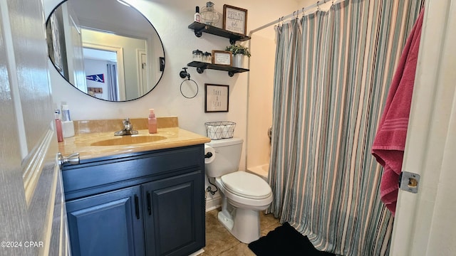 full bathroom featuring tile patterned floors, vanity, shower / bath combination with curtain, and toilet