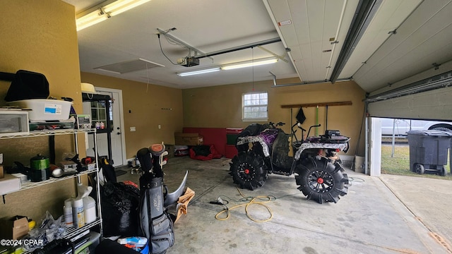 garage featuring a garage door opener