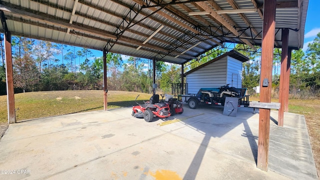 view of parking with a carport and a lawn