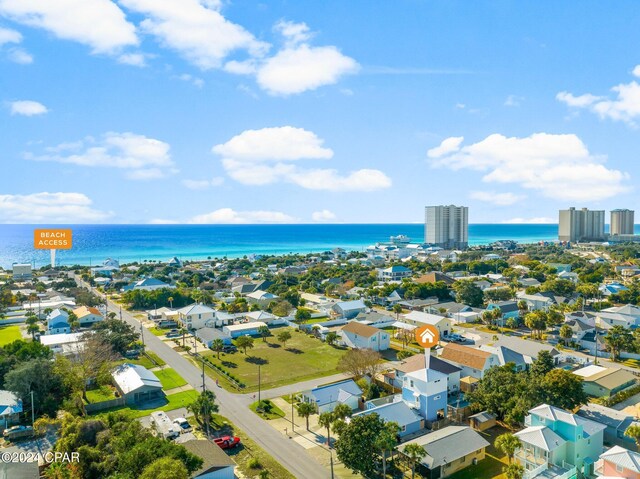 bird's eye view featuring a water view and a residential view