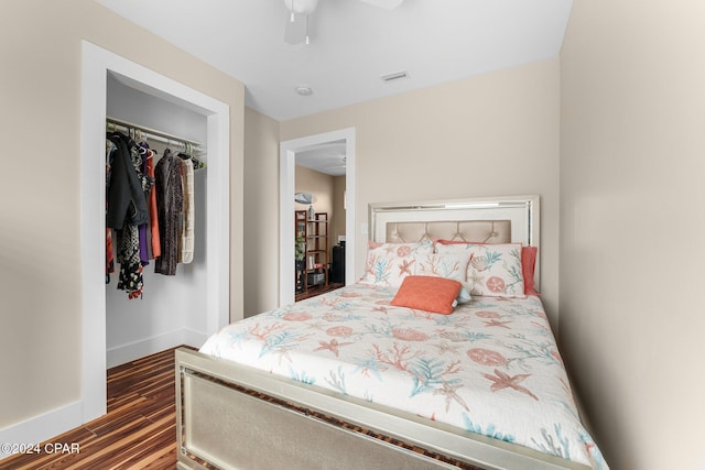 313 Argonaut St, Panama City Beach, FL 32413 - bedroom featuring ceiling fan, dark wood-type flooring, visible vents, baseboards, and a closet
